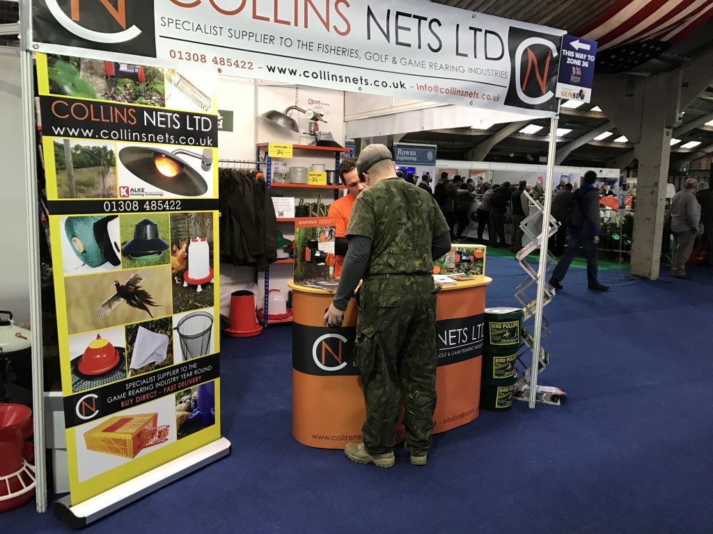 serving customers at the british shooting show